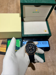 Submariner Rose Gold Black Dial Oysterflex