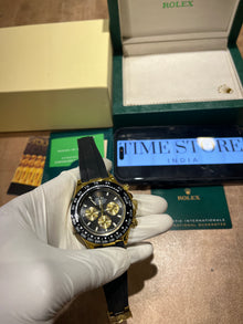 Daytona Gold Black Dial Oysterflex
